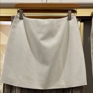 Elegant Bebe White Miniskirt